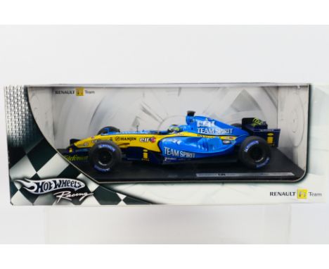 Hot Wheels - A boxed 1:18 scale Hot Wheels 'Racing' G9730 Renault R25 F1 diecast racing car. 'Giancarlo Fisichella'. The mode