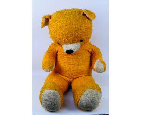 Chad Valley - A large Chad Valley Teddy Bear. The synthetic filled bear with black plastic eyes and black vertically stitched