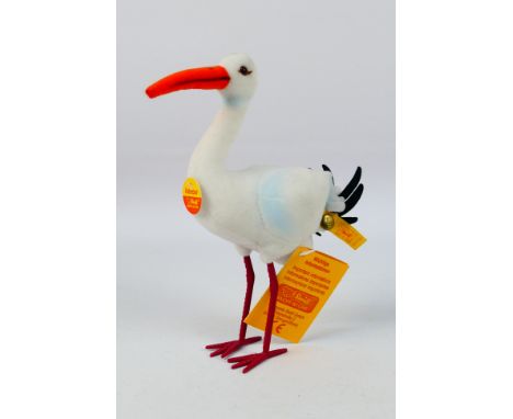 Steiff - A boxed Steiff 'Adebar Stork''. The Stork which stands 18cms in height, comes with Steiff button and yellow label to