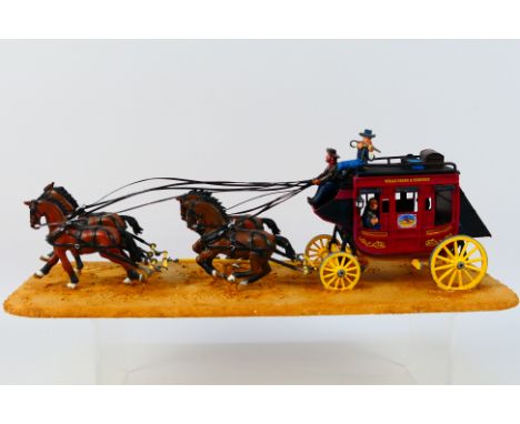 Unmarked Maker - A kit built painted white metal possibly 1:32 scale model of a Wells Fargo Overland Stagecoach. The model se