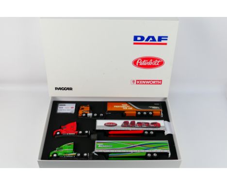 WSI Models - A boxed limited edition set of 3 x Paccar Group trucks in 1:50 scale featuring DAF, Peterbilt and Kenworth truck