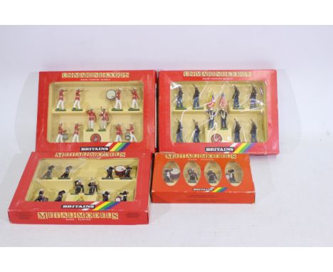 Britains - A collection of four Britains Metal-Models sets comprising of 7203- Royal Marine Drum and Bugle. 7305- U.S. Marine