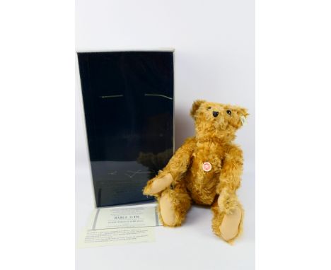 Steiff - A boxed Limited Edition Steiff 'Barle 35 PB 1904 Teddy Bear'. The bear which stands 35cms in height, comes with Stei