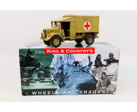 King & Country - A boxed King & Country '8th Army' series EA27 Desert Austin K2 Ambulance with Driver. The model appears to b