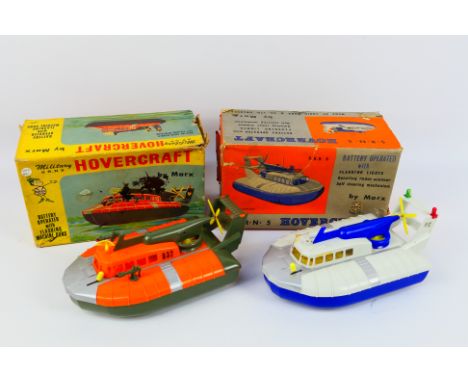 Marx Toys - 2 x boxed battery powered S.R.N5 Hovercraft models, one in civilian livery and one in military livery # 9902 and 