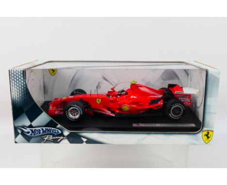 Hot Wheels - A boxed 1:18 scale Hot Wheels 'Racing' K6629 Ferrari F2007 diecast racing car, 'Kimi Raikkonean'. The model show