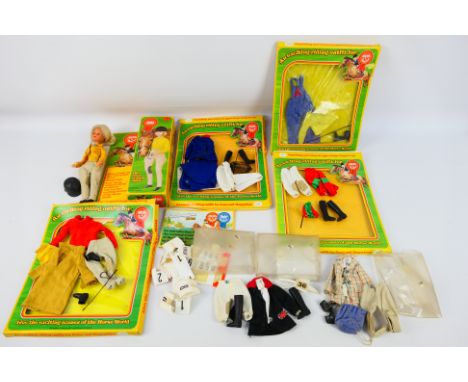 Pedigree - The Champions - A boxed Pedigree 'The Champions' doll with a small collection of boxed and loose associated dolls 