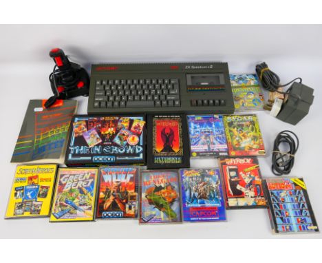 Sinclair - An unboxed Sinclair ZX Spectrum + 2 with joy stick, power lead, instruction manual and 12 x boxed games including 