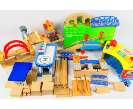 Thomas and Friends - An assortment of unboxed Thomas and friends wooden railway track accessories including an engine shed, a