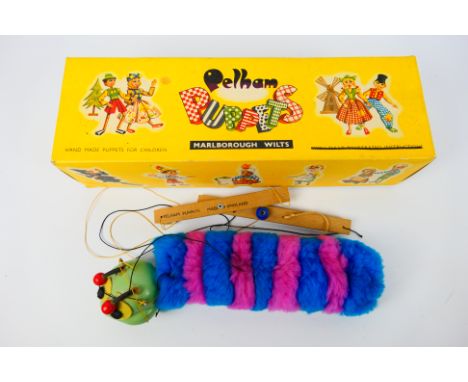 Pelham Puppets - A boxed #A6 Caterpillar Pelham Puppet - Puppet is 25 cm in length. Caterpillar is presented in a lift off li
