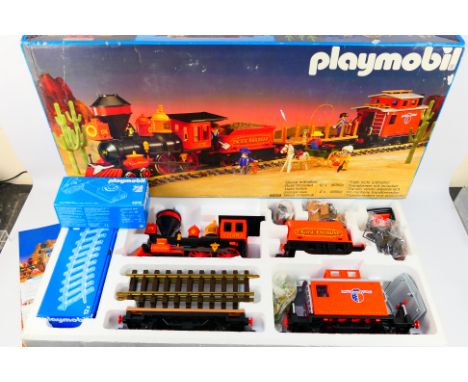 Playmobil - A boxed Playmobil #4034 Large Western Train Set. The set appears to be in Mint condition with some parts still co