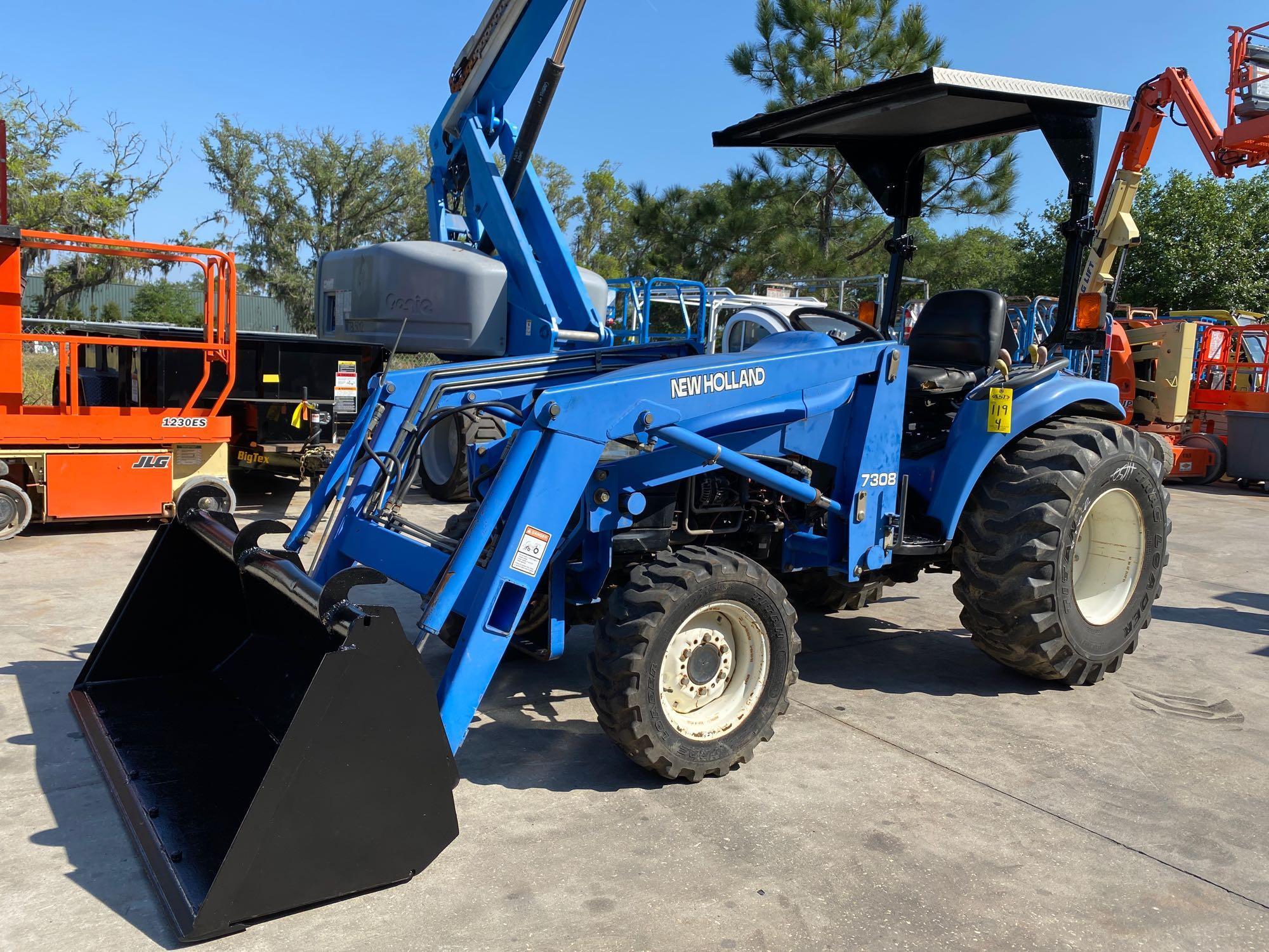 NEW HOLLAND TC33 7308 TRACTOR WITH FRONT LOADER 60" BUCKET ATTACHMENT