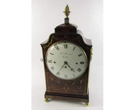 A Regency mahogany and brass inlaid table clock, by Thomas Sherwood, Leeds, the case with pagoda top and pineapple finial, br