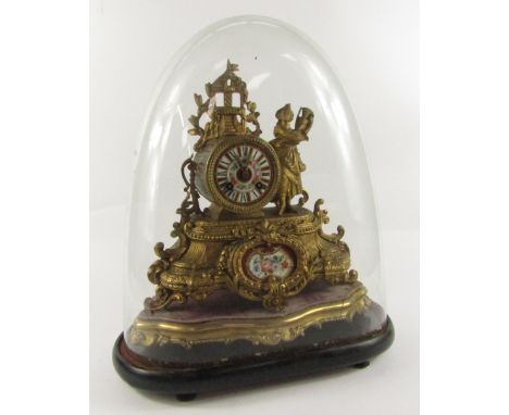 A French late 19thC gilt metal mounted clock, the barrel case with pagoda surmount, flanked by a lady holding an amphora, on 