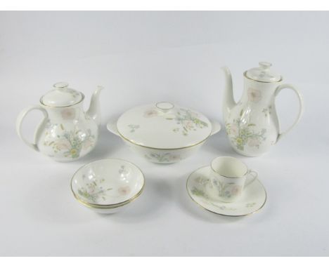 A Royal Doulton porcelain part dinner, tea and coffee service decorated in the Flirtation pattern, comprising oval meat platt