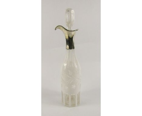 A late 19thC white frosted glass decanter and stopper, decorated with flowers, white metal mount and spout, 34cm high.