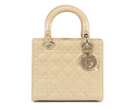 Christian Dior: a Beige Patent Leather Medium Lady Dior2016Cannage quilted patent leather with champagne gold hardwareConditi