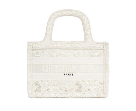 Christian Dior: a White Lace Micro Book ToteLimited edition 2022Macramé effect with name plate to frontCondition Grade A23cm 
