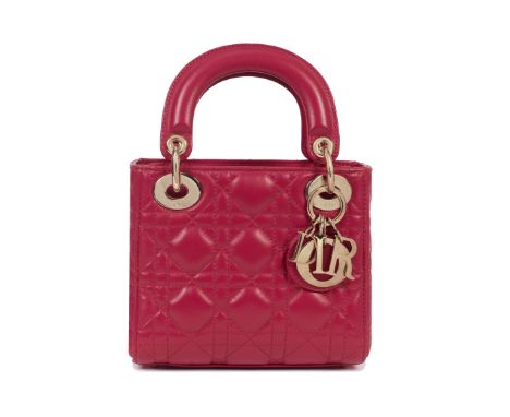 Christian Dior: a Rouge Vif Mini Lady Dior2018Cannage quilted red lambskin with gold hardwareCondition Grade A17cm wide, 15cm