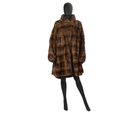 Fendi Fendissime: a Reversable Mink Rain CoatSwing coat design with full sleeves and large folding collar, brown fabric to re