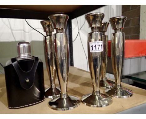 Five polished steel candlesticks and a hip flask. Not available for in-house P&amp;P 