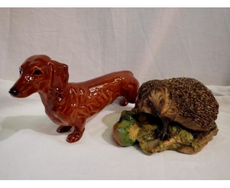 Goebel dachshund and a Border Fine Arts hedgehog, both items in good order, no chips cracks or visible damages. UK P&amp;P Gr