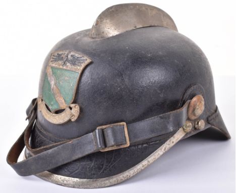 Imperial German Style Fire Brigade Helmet, leather shell with comb fitting to the top. Brass side bosses and leather chinstra