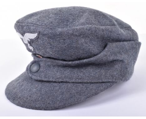 Luftwaffe Field Divisions M-43 Pattern Field Cap, mint un-issued example of the M-43 field cap with single button front. Cap 