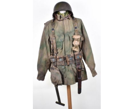WW2 American 517th Parachute Regimental Combat Team Grouping, interesting camouflaged M-42 pattern jump jacket with four pock