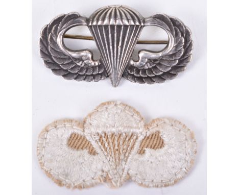 WW2 American Parachute Jump Wing, fine sterling silver example with brooch pin fitting to the reverse. Accompanied by a cloth