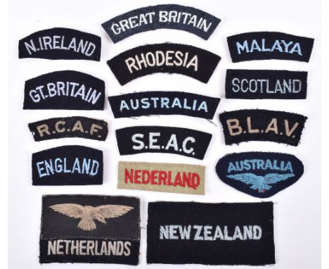 Selection of Royal Air Force Nationality Shoulder Titles, consisting of printed arm eagle over embroidered white on black “NE