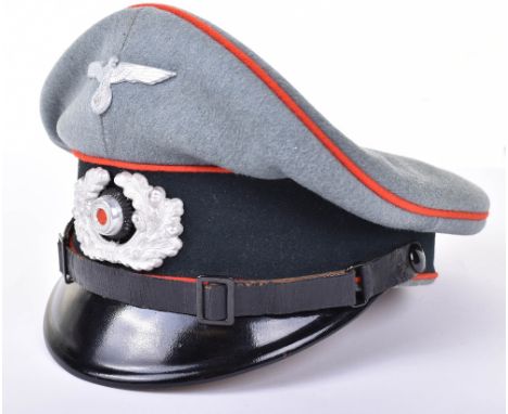 WW2 German Artillery NCO’s Peaked Cap, fine quality officers quality peaked cap with good combat saddle shape. Dark green cen