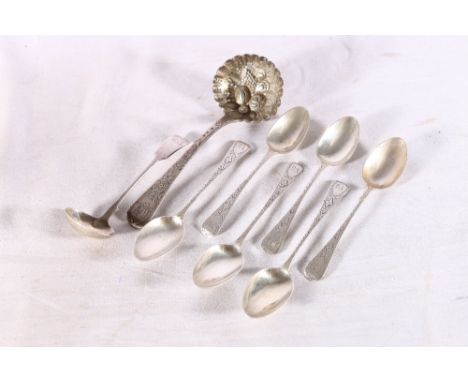 Georgian silver sifting spoon with fruit decoration to the bowl possibly by John Lias, London 1817, a Victorian silver ladle 