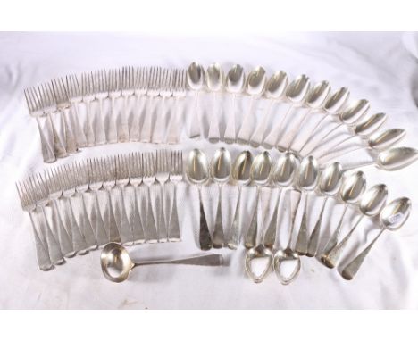 Suite of Irish silver flatware comprising twelve table spoons, twelve table forks, twelve dessert spoons, twelve table forks 