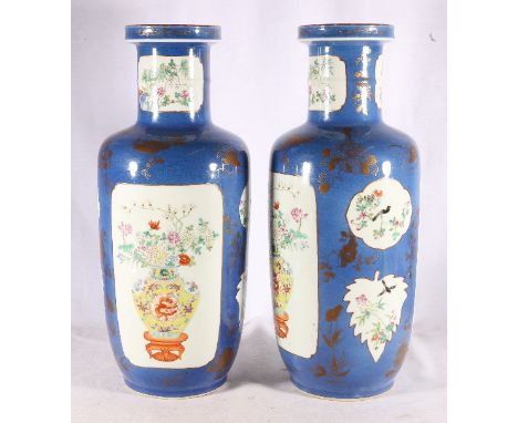 Pair of 19th Century Chinese roleau vases decorated with birds and flowers and flower vase panels reserved on a powder blue g