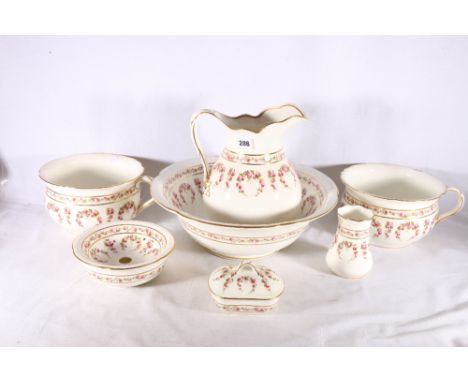 George Jones and Sons Crescent china wash set with rose decoration comprising ewer, basin, soap dish, chamber pot etc.&nbsp; 