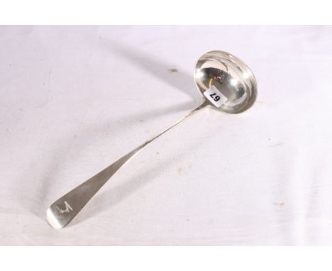 Georgian silver ladle of oar pattern engraved with arm and sword crest, marks possibly for Newcastle 1795/1819, 194g 31cm lon