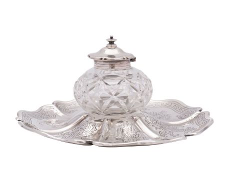 A Victorian silver inkstand, maker Henry Wilkinson &amp; Co John Brashie, London 1885, the shaped circular base with engraved