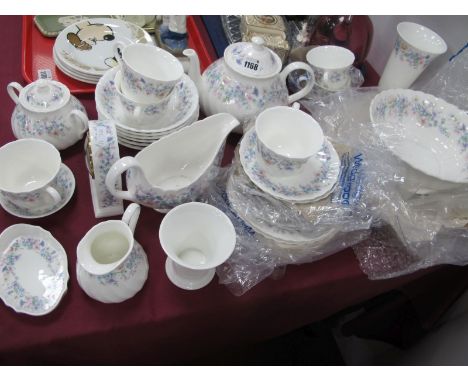 Wedgwood 'Angela' Bone China Table Ware, of approximately forty five pieces, including teapot, clock.