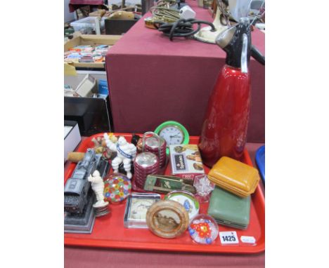 A Soda Syphon, bakelite salt-pepper pot, travelling clock, Wade figures:- One Tray.