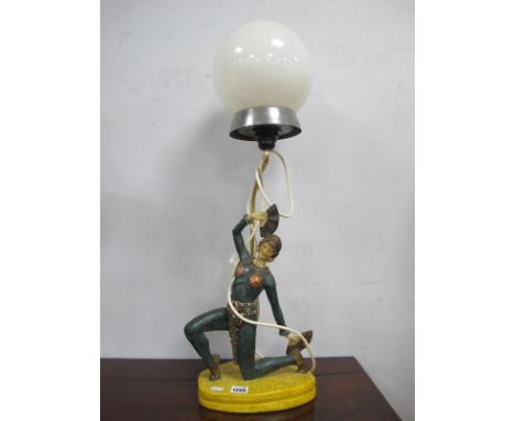 Resin Table Lamp, in the form or an Art Deco dancer, with upper globular shade, 73cm high.