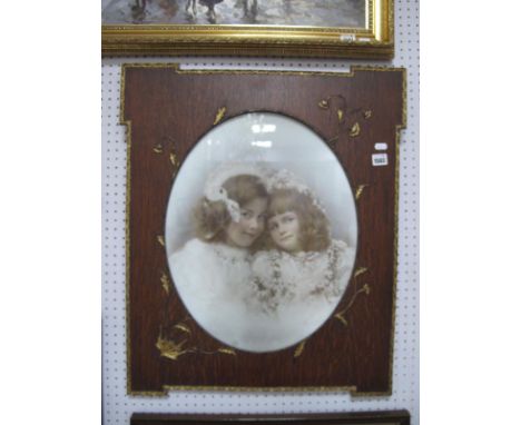 Rosemont, Oval Portrait Study of Sisters, circa 1900, in period oak and gilt frame, image 49.5 x 39.5cm.