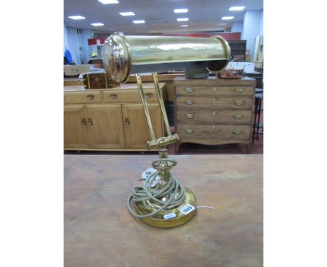 A XX Century Brass Desk lamp, on a circular base.