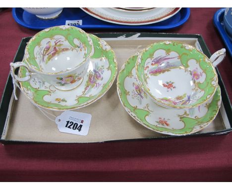 XIX Century Pottery Tea Cups with Saucers, in the Rockingham manner painted with exotic birds numbered N4529 (4)