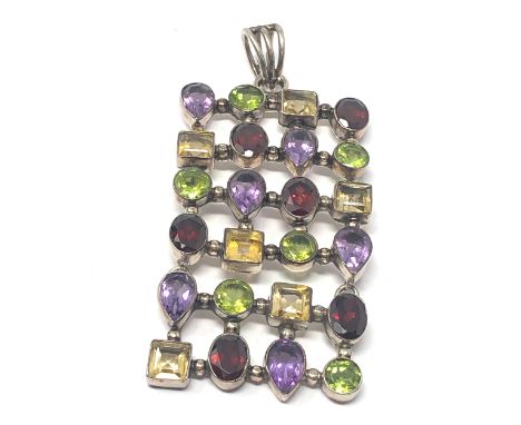Large gemset silver pendant measures approx 7.6cm drop by  3.4cm wide 