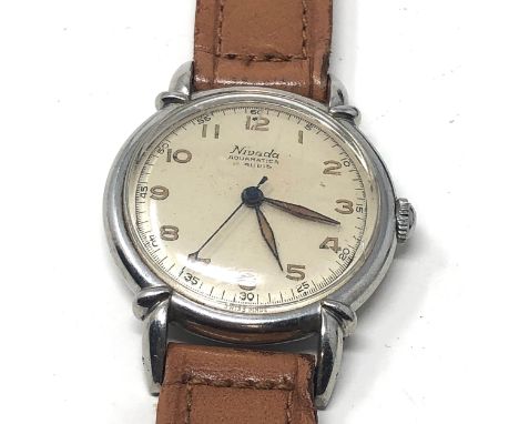 Vintage Nivada aquamatic wristwatch the watch is ticking but does not fully wind 