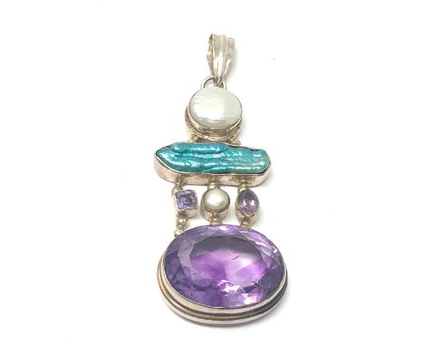 Large arts &amp; crafts gemset silver pendant measures approx 7cm drop by  2.7 cm wide 