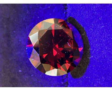 22ct conical ruby red garnet round cut - no coa 