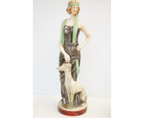 Large art deco figure of a lady & dog possibly chalk Height 63 cm 