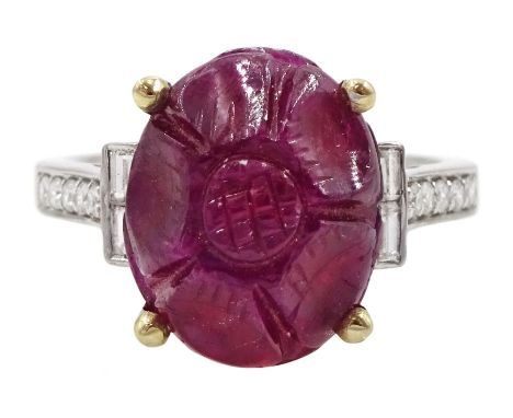 18ct white gold carved ruby ring, set with two baguette cut diamonds either side and diamond set shoulders, ruby approx 6.00 